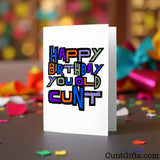 Old Cunt birthday card on a blurred background of party decorations