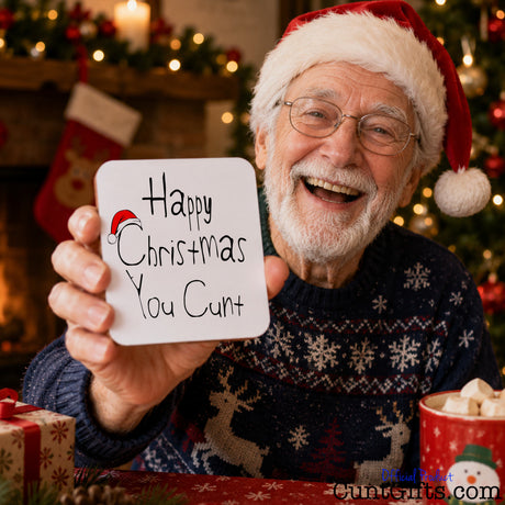 Happy Christmas You Cunt drink coaster held by man in festive clothing with white beard.