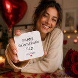 Happy Valentines Day You Cunt - drink coaster held by smiling woman with roses and heart balloon.