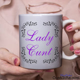 Lady Cunt Mug held by woman in pink blouse