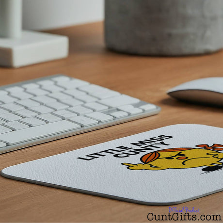 Little Miss Cunty Mouse Mat on desk with plant pot and keyboard