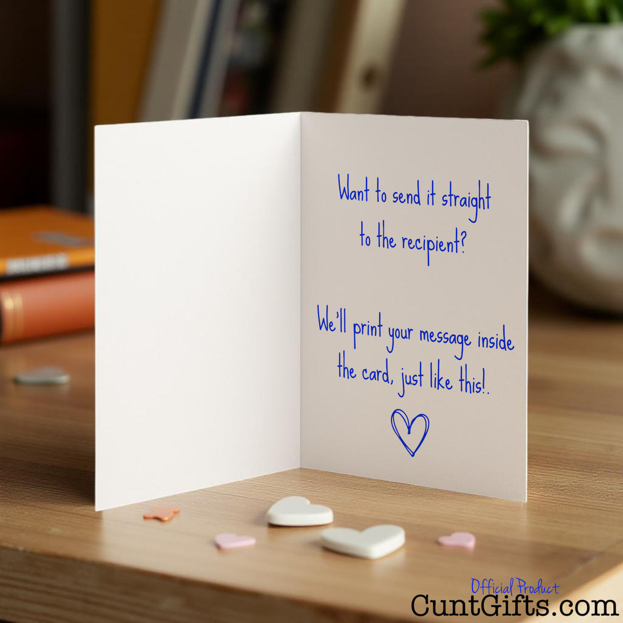 Cunt card opened showing a personalised romantic message inside with a heart in blue writing.