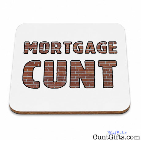 A square white coaster with rounded corners featuring the words 'MORTGAGE CUNT' in large block letters filled with a brown brick pattern and black outlines. The coaster is shown on a clean white background with a small 'Official Product CuntGifts.