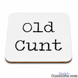 A square white drinks coaster with rounded corners and a thin natural wood edge, printed with the phrase 'Old Cunt' in a black handwritten-style font.