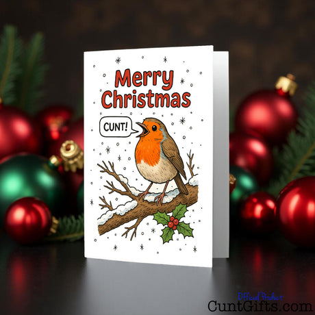 Robin saying Merry Christmas Cunt on festive greeting card with bauble background