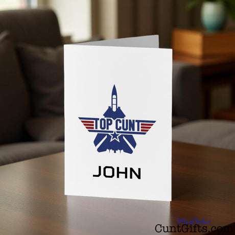 Top Cunt personalised Greeting card  on a table in a living room setting