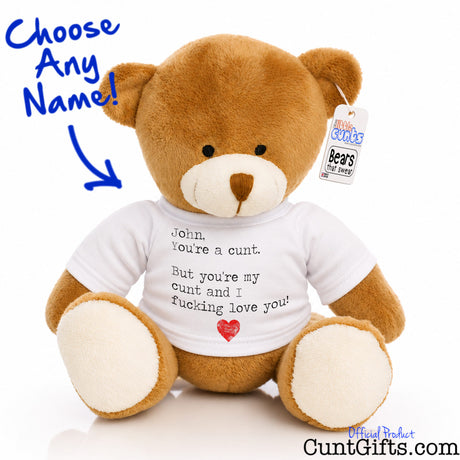 A plush teddy bear sitting against a white background, wearing a white personalised T-shirt that reads Any Name You're a cunt. But you're my cunt and I fucking love you. Version 2.