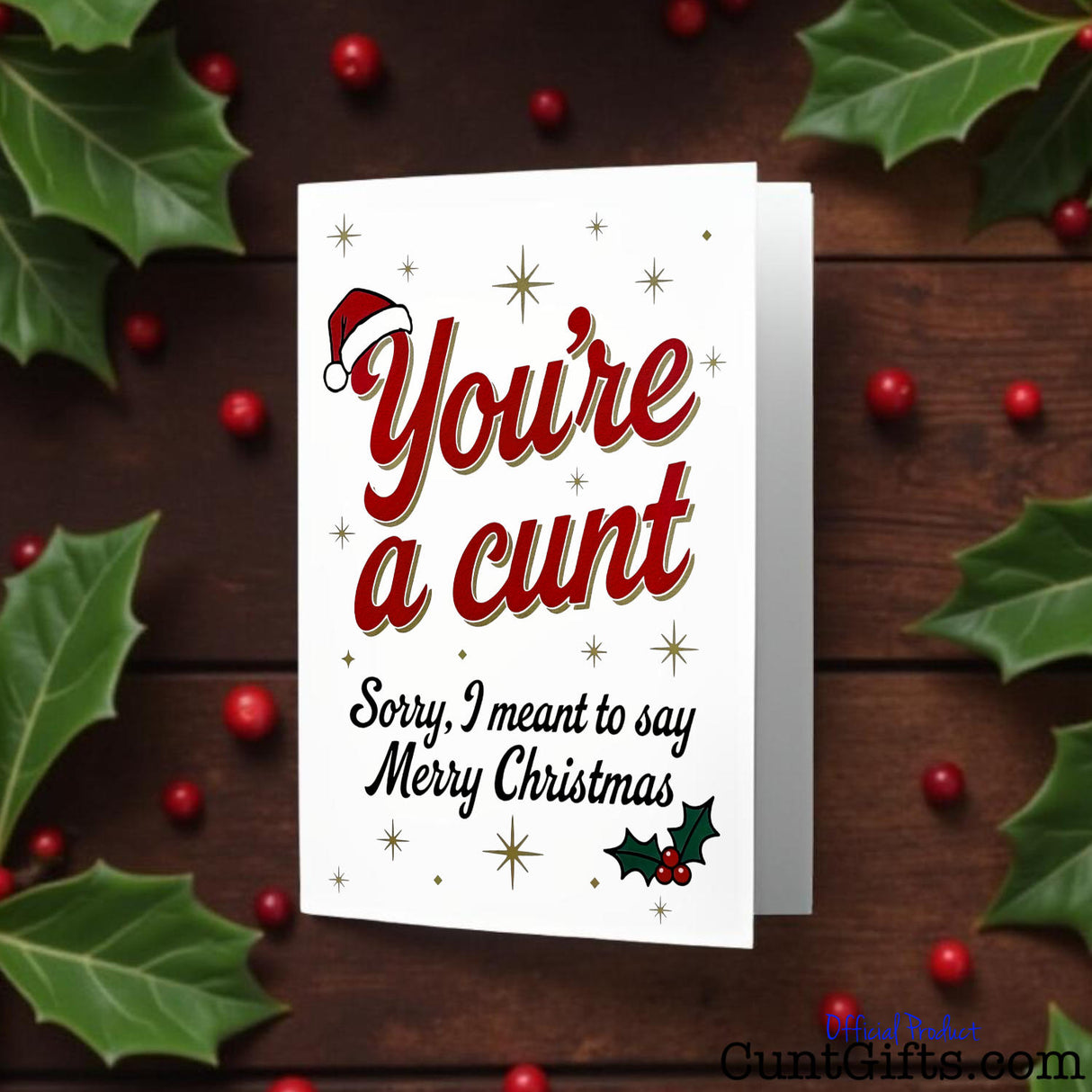 "You’re a cunt. Sorry, I meant to say Merry Christmas"  Card with hollie and berries