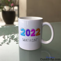 2022 - What a cunt - Mug on Glass Table