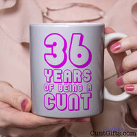 Any Years of Being a Cunt - Pink Birthday mug held by woman in pink blouse