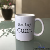 Brainy Cunt - Mug on Glass Table