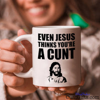 Even Jesus Thinks Your a Cunt Mug - Mug held with a smile