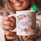 Floral Cunt Mug - held with a smile