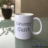 Grumpy Cunt - Mug on Glass Table