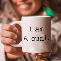 I am a cunt - Mug held with a smile