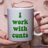 I work with cunts - Mug held by woman in pink blouse