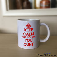 Keep Calm and Fuck Off You Cunt Mug on Sideboard