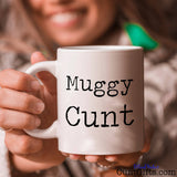 Muggy Cunt - Mug held with a smile