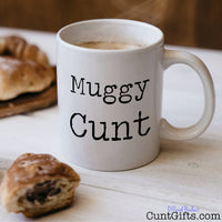 Muggy Cunt - Mug with coffee and pastries