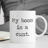 My boss is a cunt - Mug on desk with man writing notes
