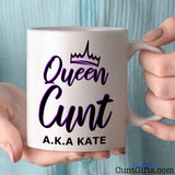 Queen Cunt Mug held by woman in blue blouse