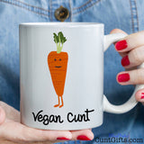 Vegan Cunt Carrot - Mug held by woman in denim shirt
